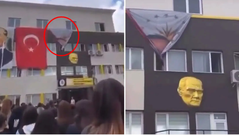 сняв плакат Эрдогана